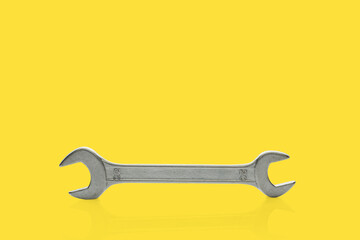 Tools isolated against a yellow background