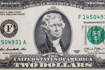 Fragment of obverse of 2 US dollar banknote