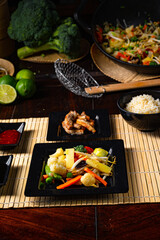 Fried vegetables from the wok with deep fried meat