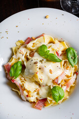 Tagliatelle with gorgonzola masarpone sauce and ham.