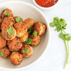 Close Up Top Down Photo of Thai Chicken Meatballs with Ketchup