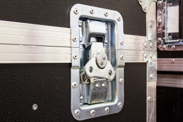 Aluminum lock of road flight case. Professional protective box for transporting equipment.