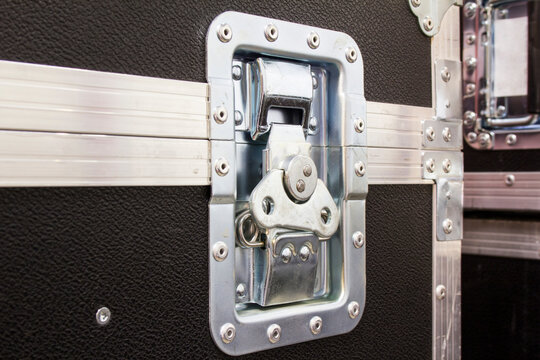 Aluminum lock of road flight case. Professional protective box for transporting equipment.
