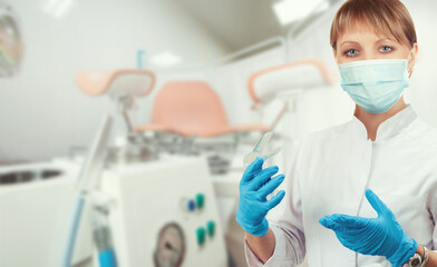 Female gynecologist in protective mask