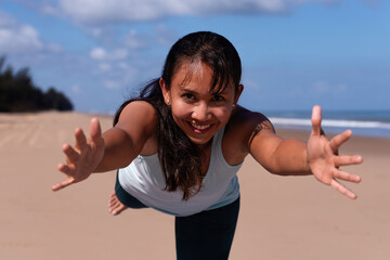 people, fitness, sport and healthy lifestyle concept - asian woman making yoga pose over tropical sea and blue sky background