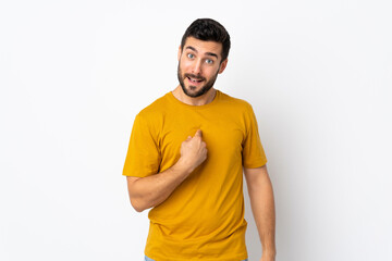 Young handsome man with beard isolated on white background with surprise facial expression
