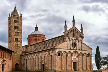Fototapeta na wymiar historic stone church with a belfry in the city of Massa Maritima