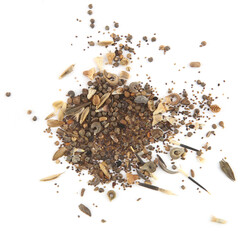 Variuos flowers seeds isolated on white background. Pile dry flowers seeds, top view.