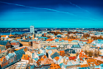 Fototapeta na wymiar Panoramic view of the city of Riga, Latvia from the height of the tower Church of St. Peter