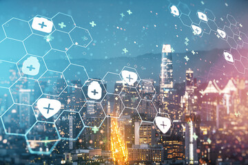 Double exposure of abstract virtual medical hologram on San Francisco city skyscrapers background. Healthcare technolody concept