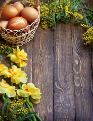 Easter empty background with Easter eggs and spring flowers