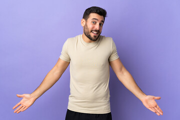 Young handsome man with beard over isolated background happy and smiling