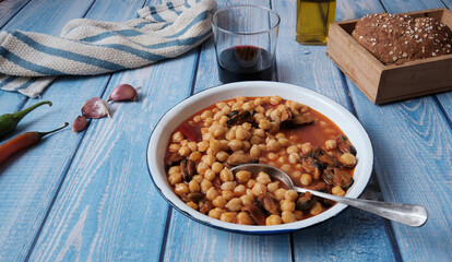 Dish of food with mussels and chickpeas, mediterranean food, ready to eat