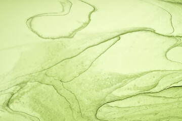 Abstract fluid art background green colors. Liquid marble. Acrylic painting on canvas with olive gradient and splash.