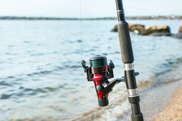 Fishing in river on summer day