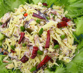 spicy mackerel salad with mix fresh vegetable, thai food.