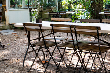 Picnic a a garden, Wooden Chairs and White Table