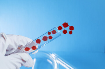 Medicine. A gloved hand holds a test tube containing the virus. Elements of a bitmap drawing. The...