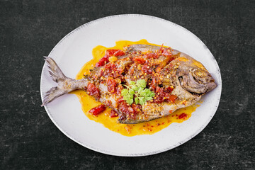 Deep fried pomfret fish and chili sauce