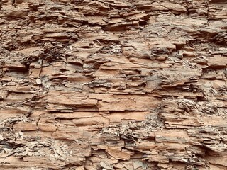 Obraz premium Natural stone Texture of the sedimentary rock. Stone wall layers of Geological photo texture