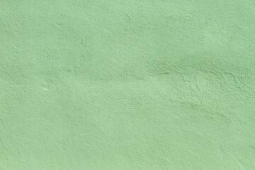 Pale green fine plaster wall texture