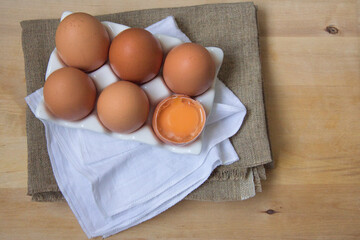 Chicken eggs on the wooden table