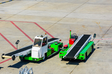 Vehicle for loading luggage in airplane at the airport in Antalya city, Turkey