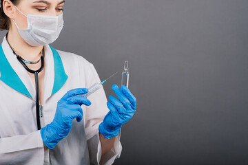 Doctor scientist with syringe analyzing virus in research vaccine to be ready for clinical trial.