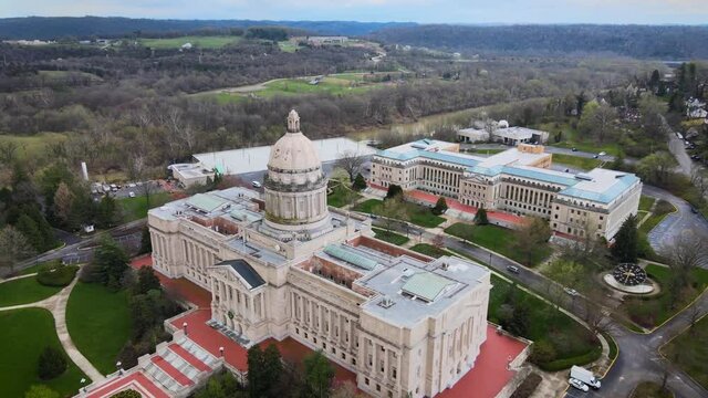 Flying towards dome of the Kentucky State Capitol Building during overcast early spring morning