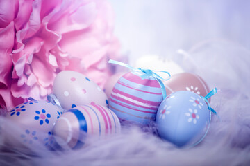 Colorful easter eggs in pastel colors with copy space.