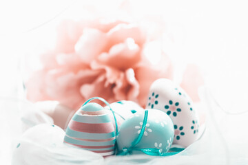 Fototapeta na wymiar Colorful easter eggs in pastel colors with copy space.