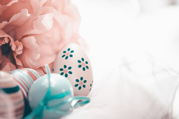 Colorful easter eggs in pastel colors with copy space.