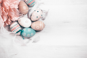 Easter background with Easter eggs. Top view with copy space.