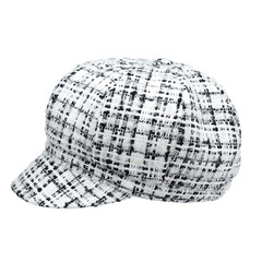 Women's cap with a visor, made of white and black wool yarn of the highest quality, isolated on a white background. Side view.