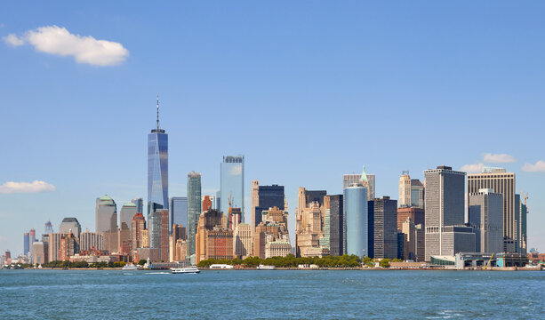 Manhattan waterfront skyline on a sunny summer day, New York City, USA.