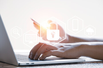 Master key and technology icons with hand using laptop computer and smartphone to input password...