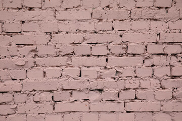 Stone pink background consisting of pink bricks