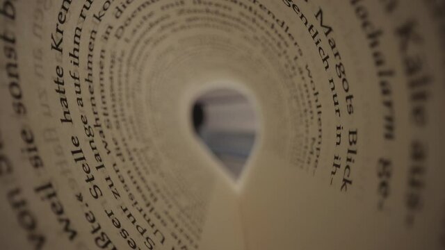 Flight through book pages in detail - studio photography