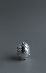 Egg in aluminum foil.