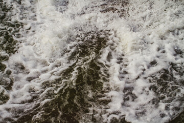 Fototapeta na wymiar water flowing into the water