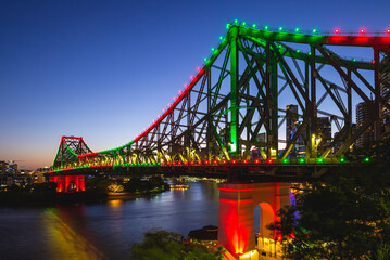 skyline of brisbane by brisbane river in queensland, australia at night