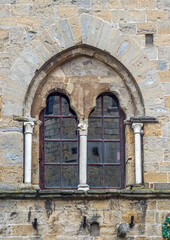 Fototapeta na wymiar ancient doors and windows of medieval historic buildings