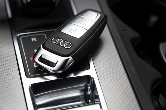 Sankt-Petersburg, Russia, March 25, 2021: Close up of Audi A6 car keys in black leather interior of a modern car. Audi A6 S-Line interior details.