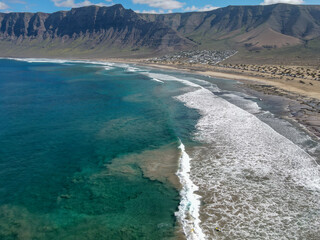 Aerial view of Famara beach at Lanzarote on Canary islands, Spain