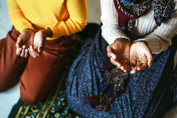 Praying and teaching, child and adult praying together