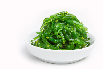 fresh green wakame seaweed salad - 423753122