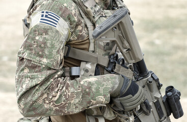Soldier with assault rifle and flag of Greece on military uniform. Collage.