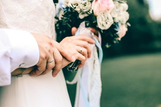 bride and groom hands