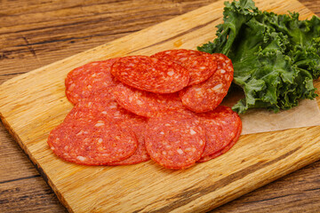 Italian spycy pepperoni sausage slices