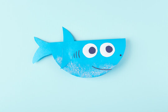 DIY and kids creativity. Step by step instruction: how to make shark from paper. Step10 finished shark craft. Children Craft workshop